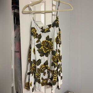 Urban outfitters yellow flower thin strap dress with v-neck.